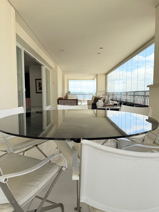 Mesa de Jantar Redonda com Tampo em Vidro e Base Tubular - Flexform